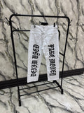 JEANS BIANCO SCRITTA DIETRO ARTICOLO USER